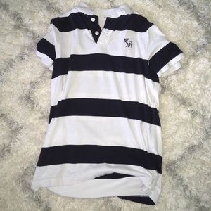 Navy blue and white striped polo shirt
